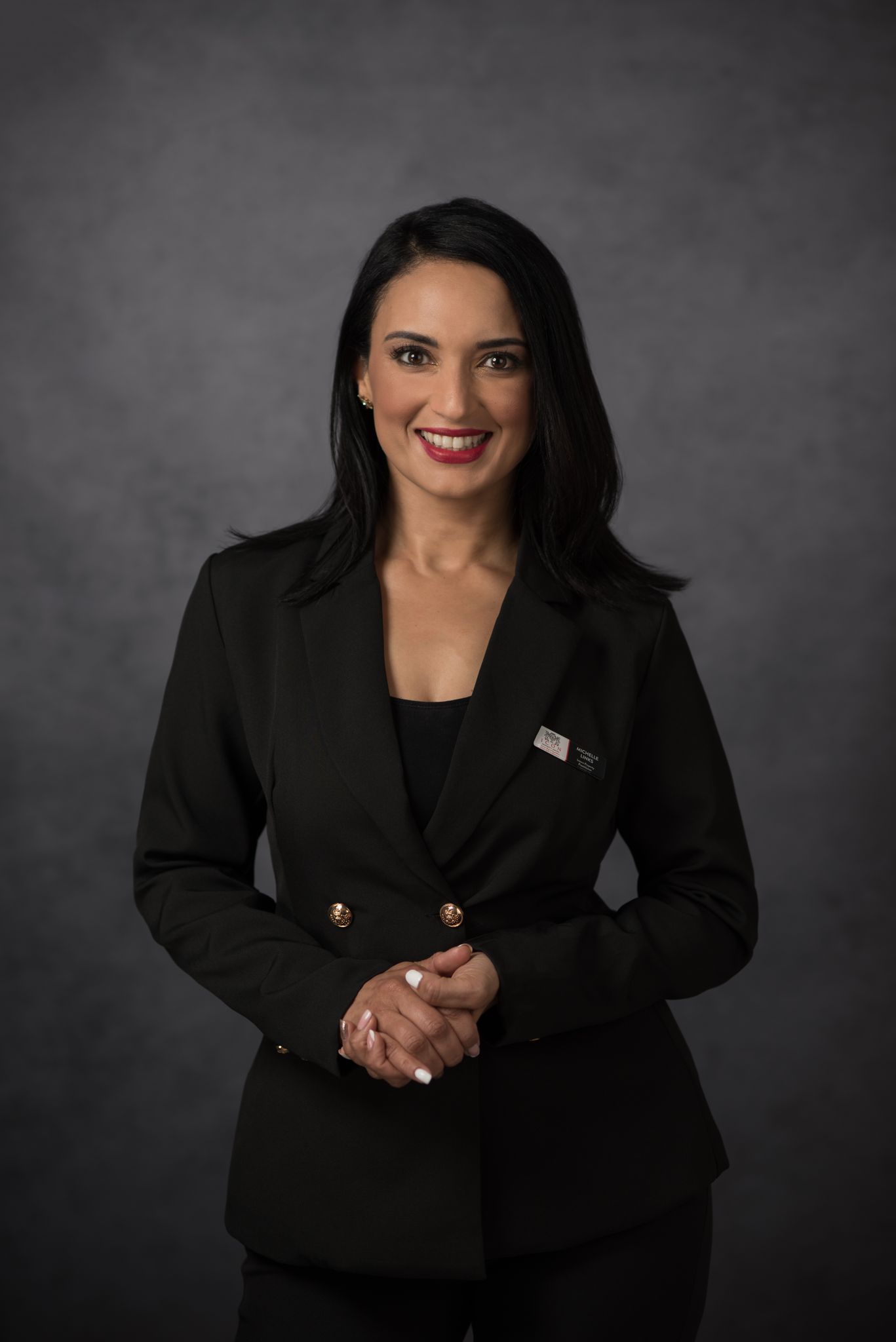 Professional woman in a black blazer with red lipstick — personal branding portrait photography in Cape Town